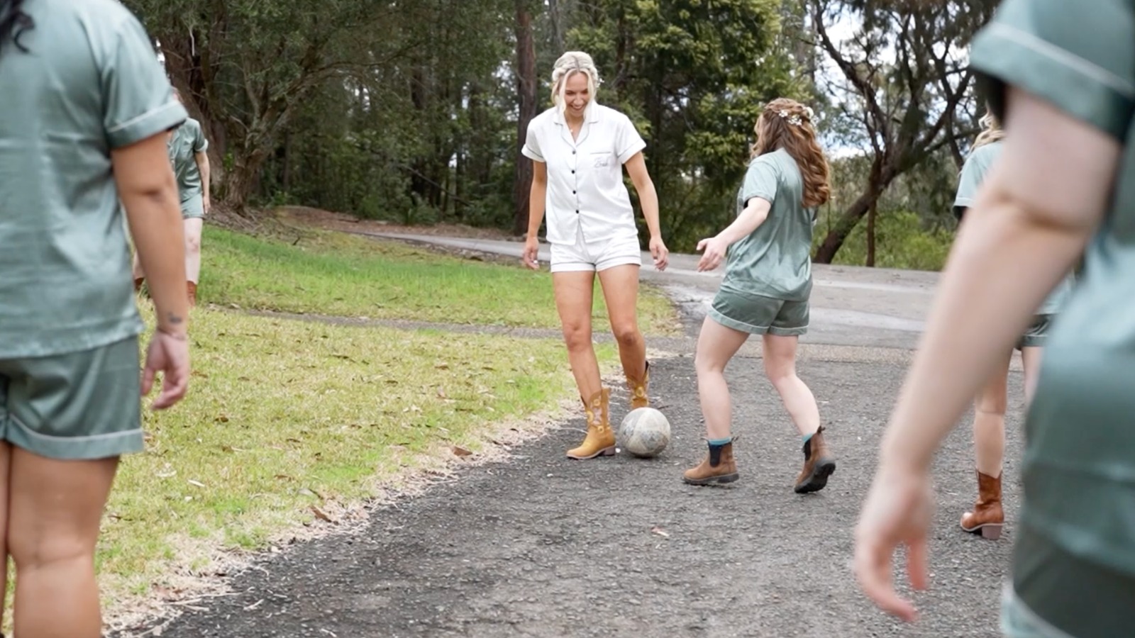 a stunning blonde bride and her bridesmaids in satin pj's before the Sydney wedding - AB Studios
